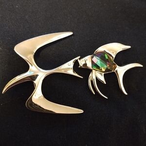 Two vintage silver tone Sarah Coventry brooches